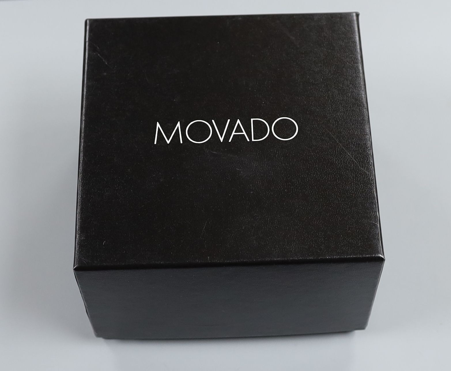 A lady's modern stainless steel Movado quartz wrist watch, on a stainless steel Movado bracelet, with box, four lady's modern quartz wrist watches, to include Ted Baker, DKNY and Emporio Armani(2), no boxes or papers.